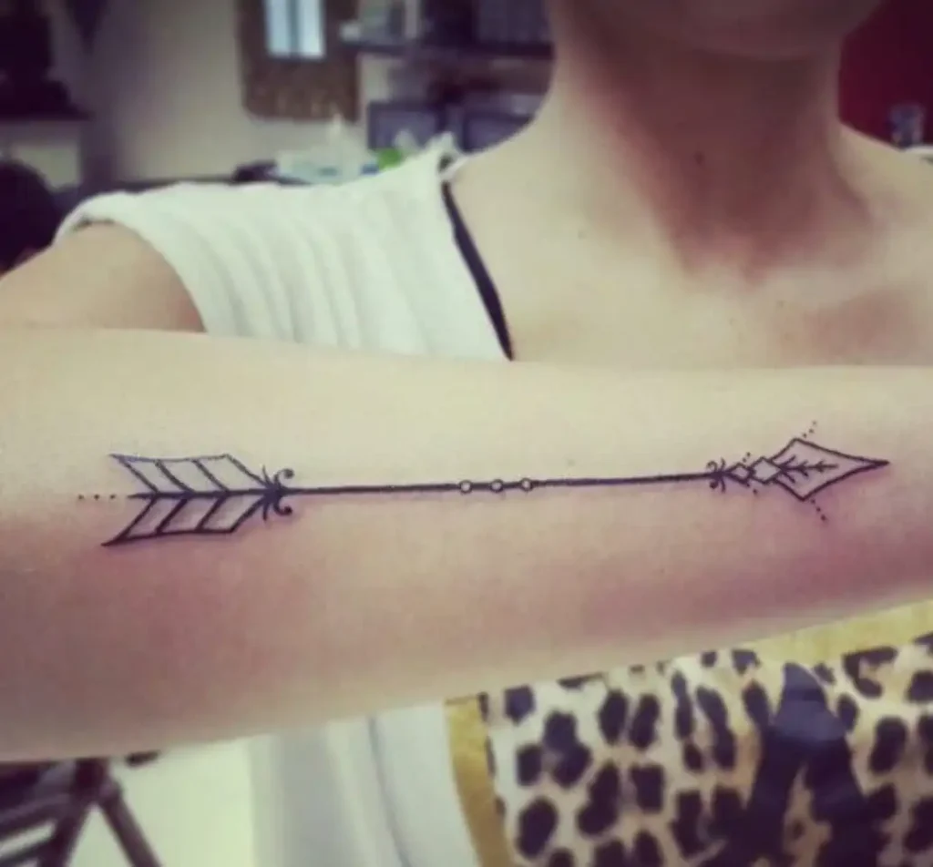 Arrow Tattoo Meaning on a Woman