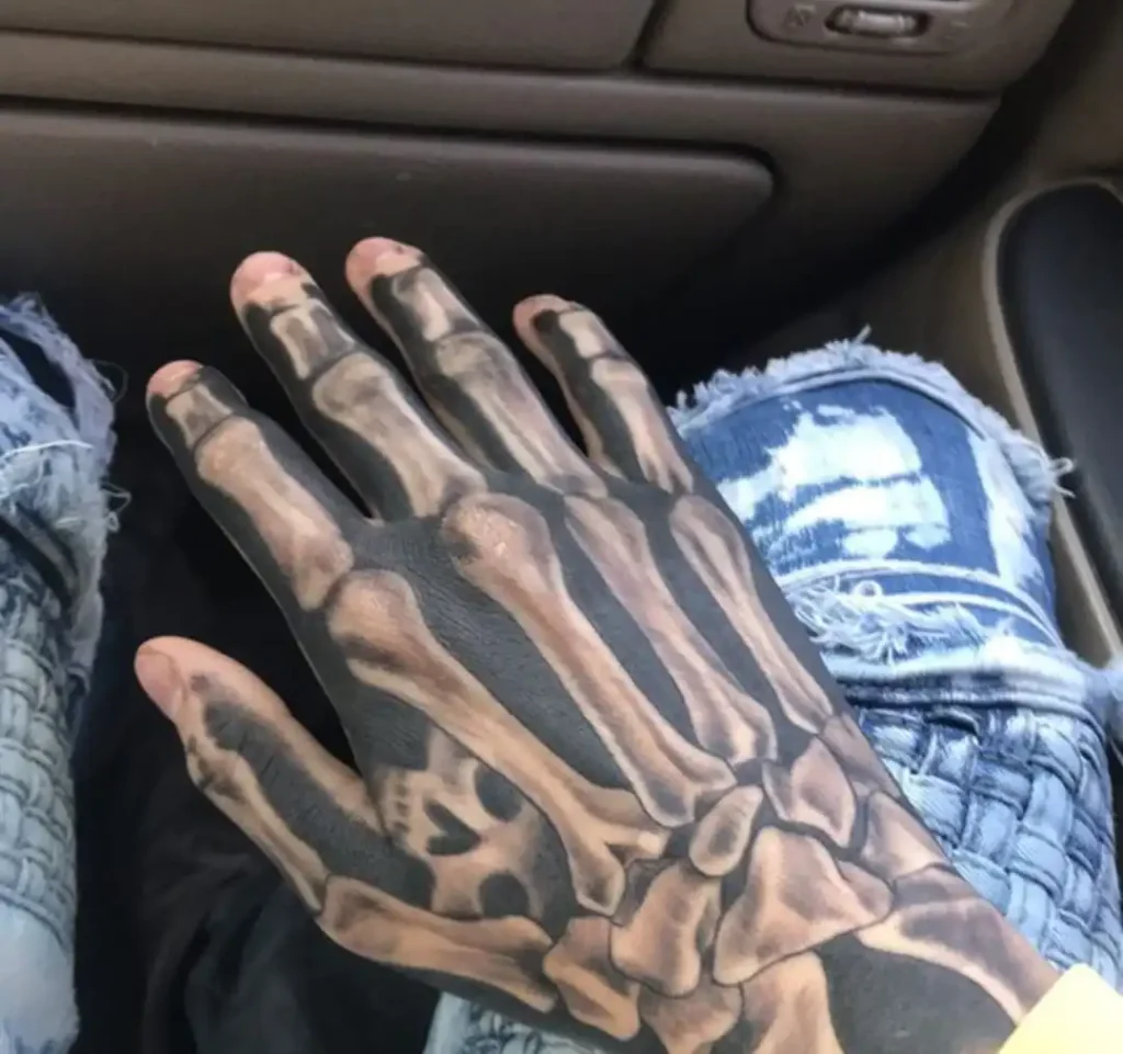 Skeleton Hand Tattoo Meaning: Symbolism History and Design Inspiration 2 Realistic Skeleton Hand Tattoos